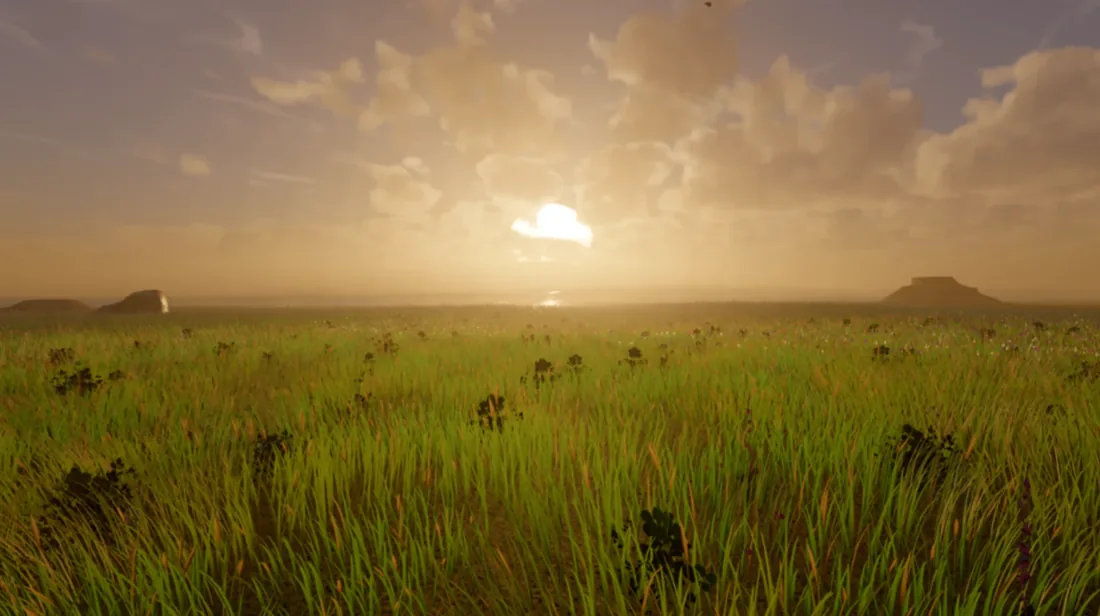 A meadow of tall grass and wildflowers at golden hour, backlit by a low sun breaking through heavy cumulus. A flat-topped mesa stands on the right of the horizon and sunlight glints on distant water.